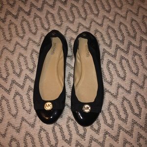 Black Michael Kors Ballet flats.